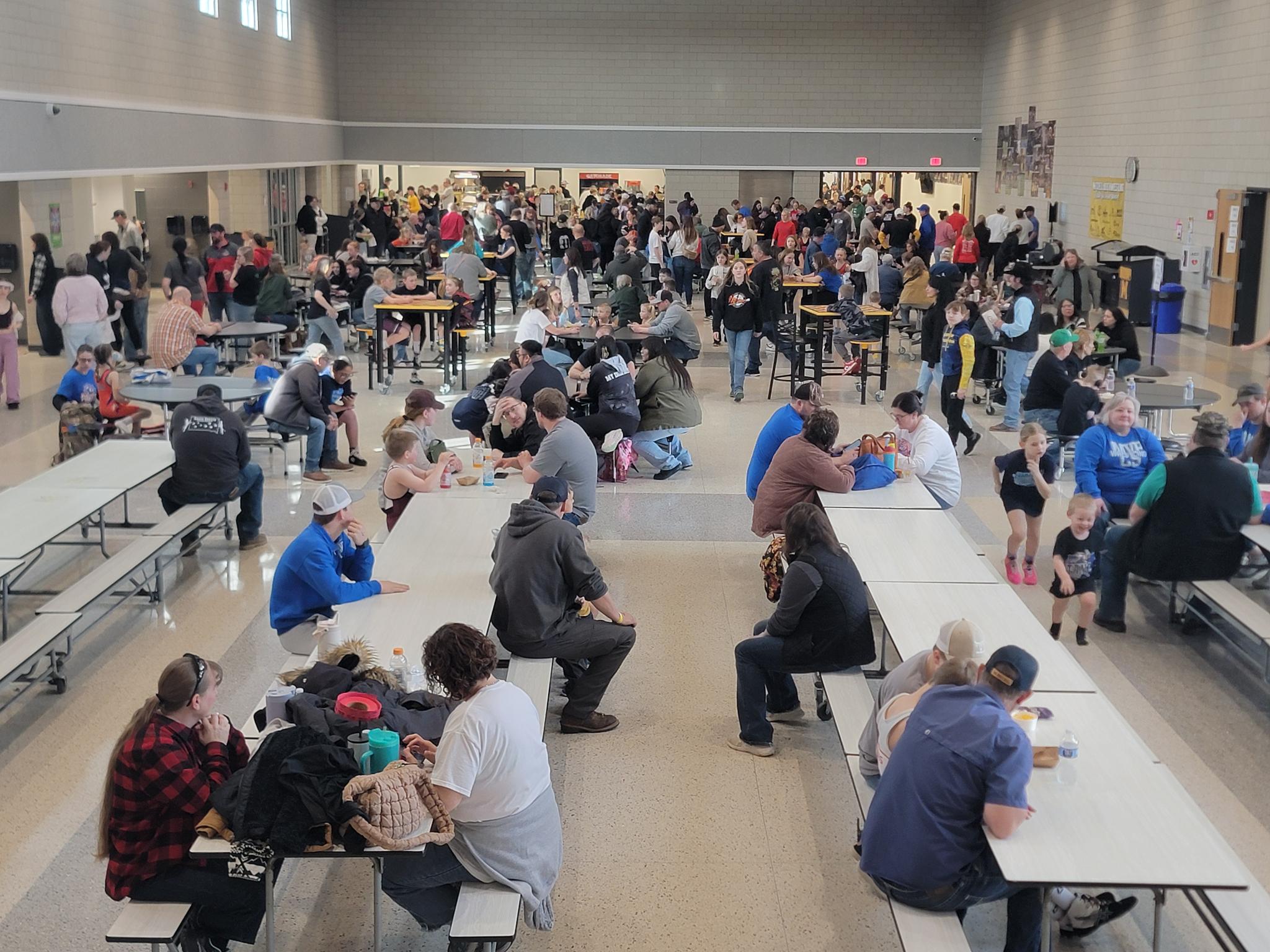 Cafeteria packed with wrestling families